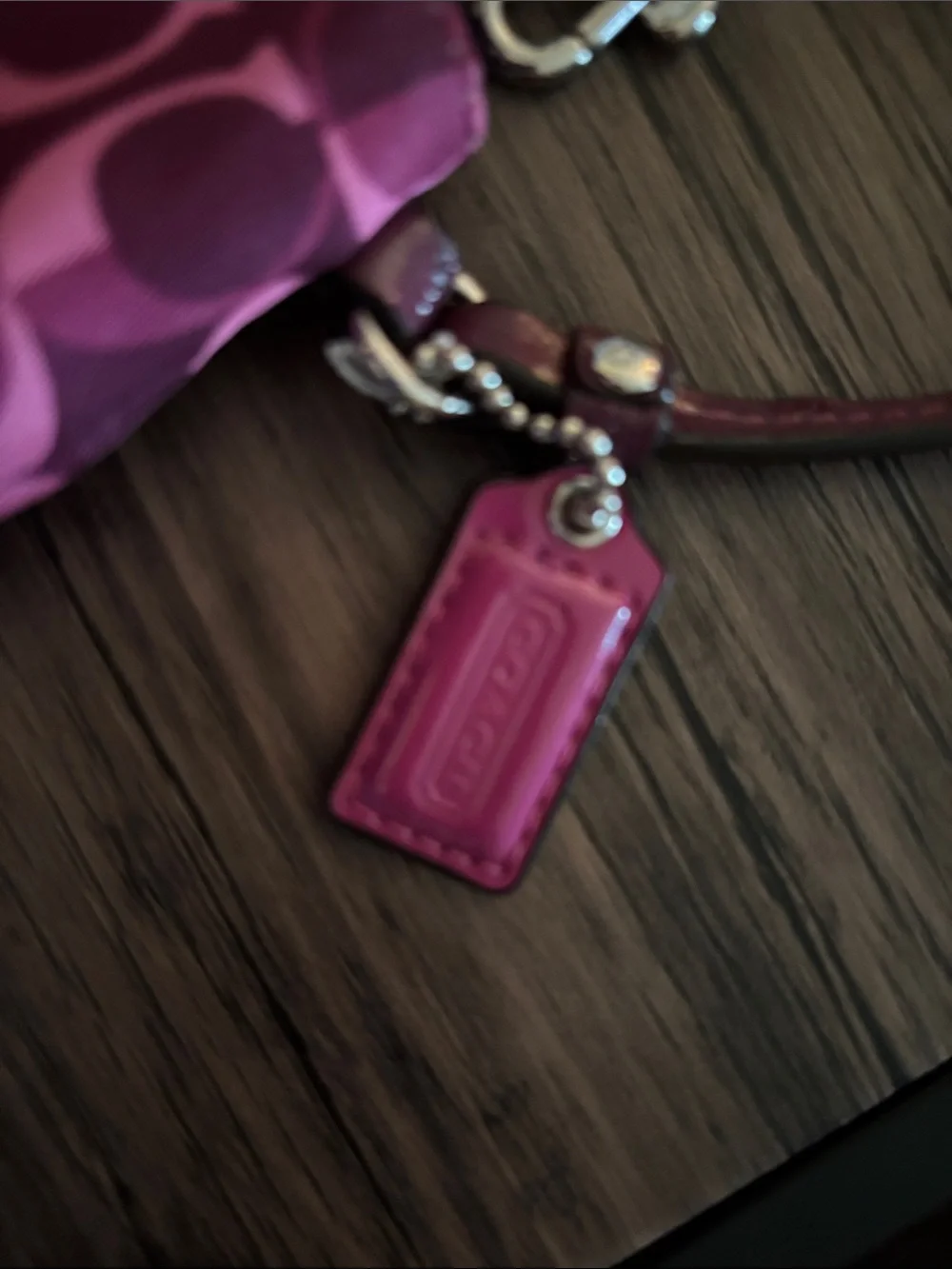 Coach Signature Wristlet in Pink and Dark Pink